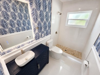 Welcome home to this beautifully upgraded villa in a peaceful - photo 7
