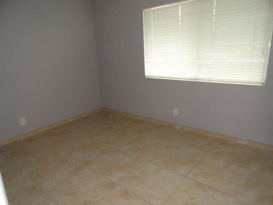 BRIGHT AND SPACIOUS second floor condo, tiled throughout - photo 8