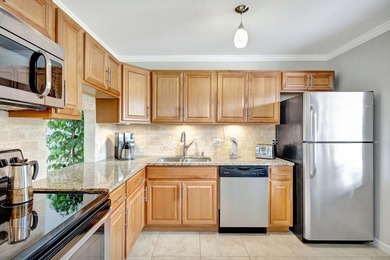 Gorgeous condo is furnished and filled with beautiful upgrades! - photo 4