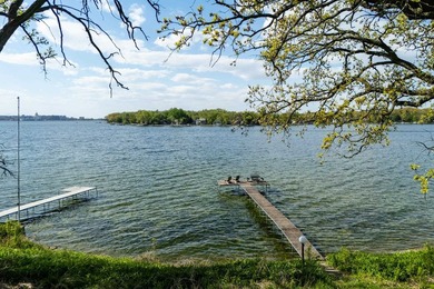 Set along a remarkable stretch of Lake Monona shoreline, this - photo 11