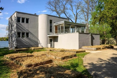 Set along a remarkable stretch of Lake Monona shoreline, this - photo 12
