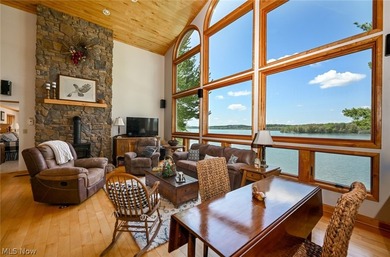 Stunning lake views immediately capture your attention upon - photo 15