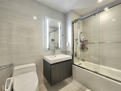 Welcome to Unit 16J at Skyview's Grand One Tower! This rare - photo 16