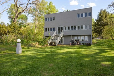 Set along a remarkable stretch of Lake Monona shoreline, this - photo 16