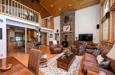 Stunning lake views immediately capture your attention upon - photo 17