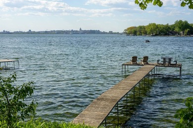 Set along a remarkable stretch of Lake Monona shoreline, this - photo 19