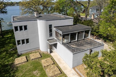 Set along a remarkable stretch of Lake Monona shoreline, this - photo 21