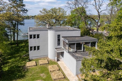 Set along a remarkable stretch of Lake Monona shoreline, this - photo 22