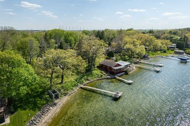 Set along a remarkable stretch of Lake Monona shoreline, this - photo 23