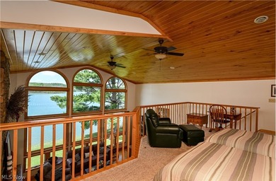 Stunning lake views immediately capture your attention upon - photo 32