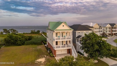 Waterfront Grandeur meets Modern Masterpiece. Positioned on the - photo 29