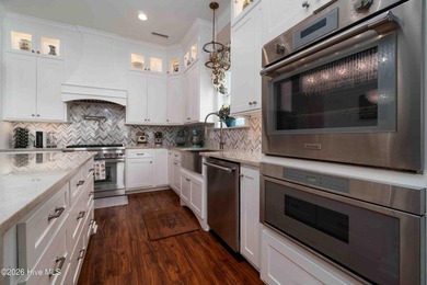 Waterfront Grandeur meets Modern Masterpiece. Positioned on the - photo 41