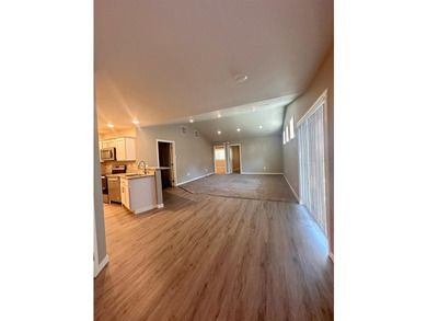 Are You Looking For A New Home That Has Zero Steps With An Open - photo 4