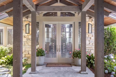 Set amongst the oaks, this stunning home connects the interior - photo 6