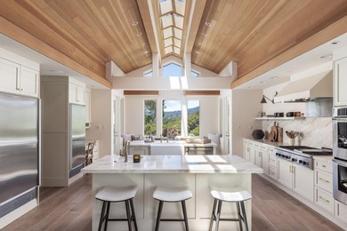 Set amongst the oaks, this stunning home connects the interior - photo 9
