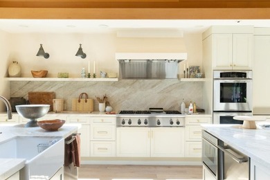 Set amongst the oaks, this stunning home connects the interior - photo 10