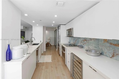 Live Where Miami Comes Alive--Yet Feels Like a Retreat.  Nestled