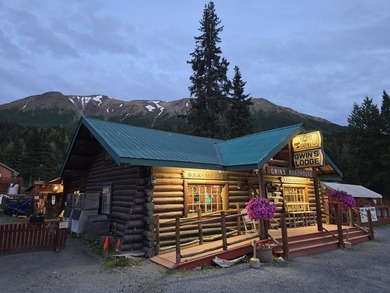 Gwin's Lodge is a historic pioneer-built log roadhouse from the - photo 5