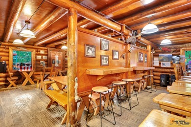 Gwin's Lodge is a historic pioneer-built log roadhouse from the - photo 7
