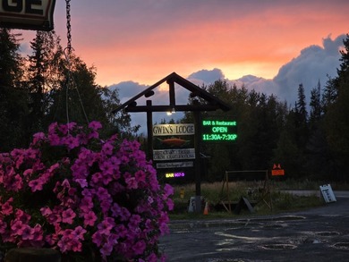 Gwin's Lodge is a historic pioneer-built log roadhouse from the - photo 8