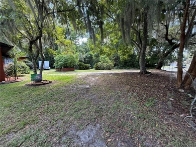 Brick 3 bedroom/2 bathroom home in SW Gainesville on a .75 acre - photo 3