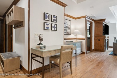 The Aspen Mountain Residences is nestled at the base of the - photo 12