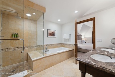 The Aspen Mountain Residences is nestled at the base of the - photo 16