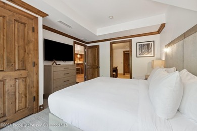 The Aspen Mountain Residences is nestled at the base of the - photo 18