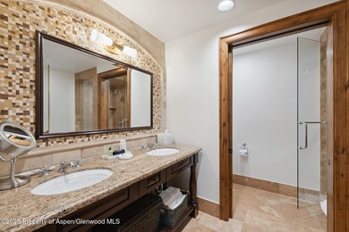 The Aspen Mountain Residences is nestled at the base of the - photo 19