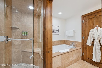The Aspen Mountain Residences is nestled at the base of the - photo 20