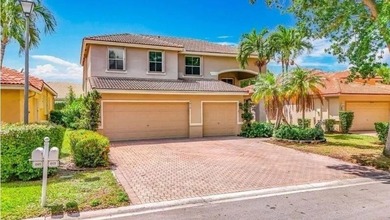 Lake Home For Sale in Coconut Creek, Florida