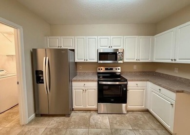 First-floor living, gated community, and the Indian River Lagoon - photo 8