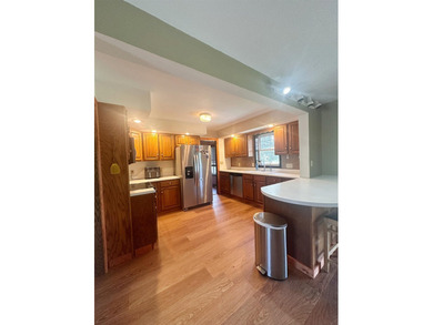 Spacious 4~bedroom, 2.5~bath home featuring a convenient - photo 6