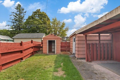 Situated on a corner lot in the sought-after Garland District