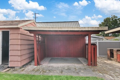 Situated on a corner lot in the sought-after Garland District