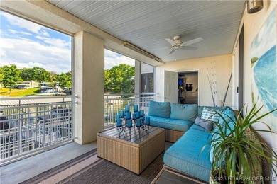 Welcome to Majestic Pointe Unit 1A, a rare end-unit in a gated