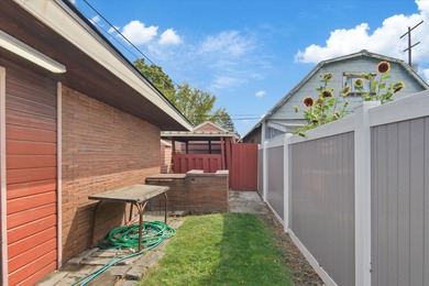 Situated on a corner lot in the sought-after Garland District