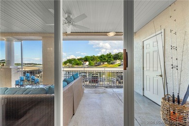 Welcome to Majestic Pointe Unit 1A, a rare end-unit in a gated