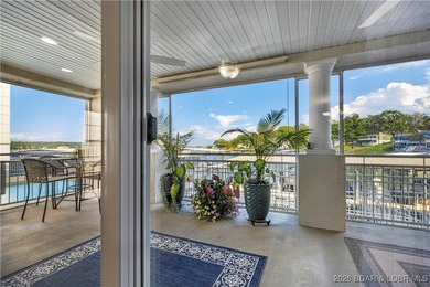 Welcome to Majestic Pointe Unit 1A, a rare end-unit in a gated