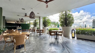 High-floor furnished studio with wide bay views. Part of the