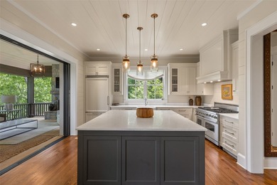 Nestled within the prestigious Wade Hampton Golf Club and just - photo 17