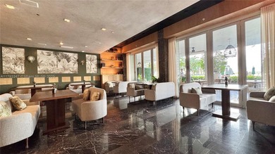 High-floor furnished studio with wide bay views. Part of the