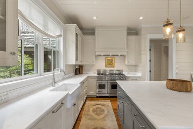 Nestled within the prestigious Wade Hampton Golf Club and just - photo 19