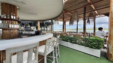 High-floor furnished studio with wide bay views. Part of the