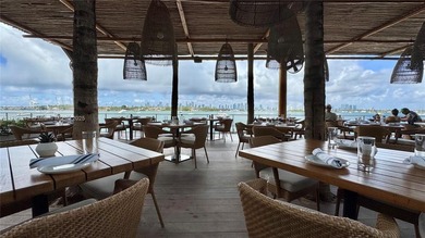 High-floor furnished studio with wide bay views. Part of the