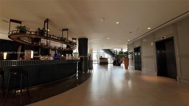 High-floor furnished studio with wide bay views. Part of the