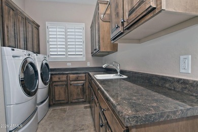 Nestled on a prime golf course lot in the highly sought-after - photo 26