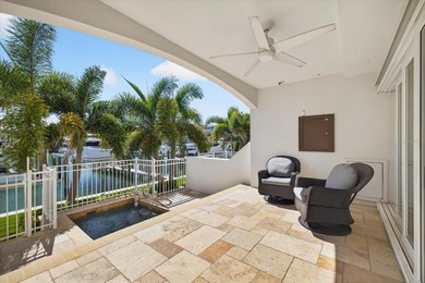 EXQUISITE WATERFRONT TOWNHOME IN THE HEART OF CLEARWATER BEACH

