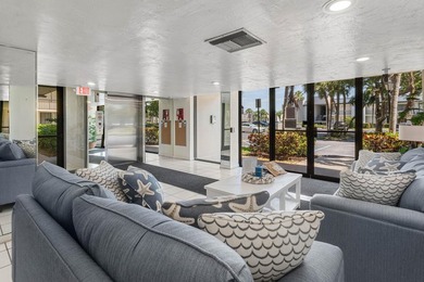 Positioned mere steps from the shoreline, this three-bedroom - photo 28