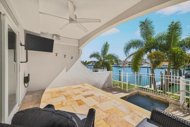 EXQUISITE WATERFRONT TOWNHOME IN THE HEART OF CLEARWATER BEACH
